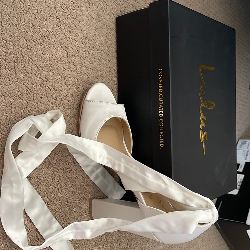 lulus Dorian white heel. Size 7. Fits 7-7.5. Lace up satin straps. Never worn